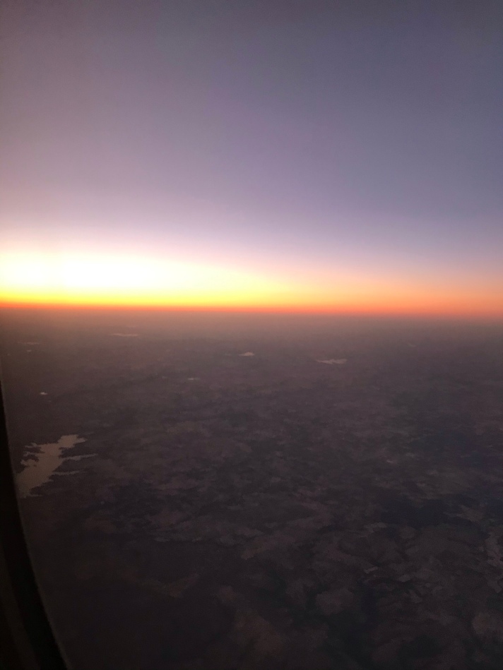 Flying west during sunset